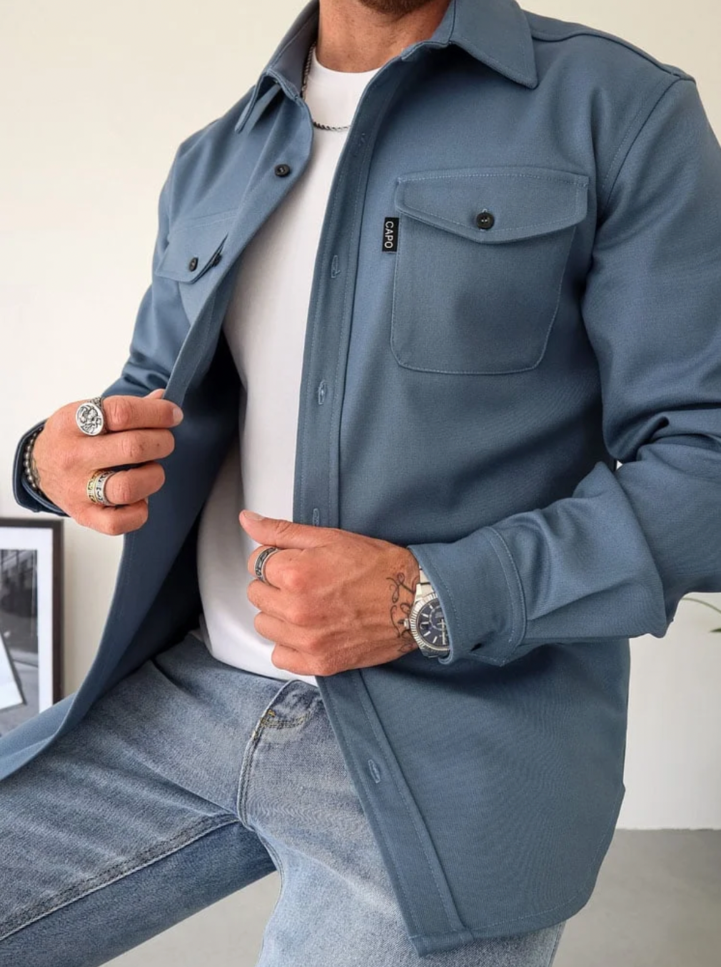 Men's chest pocket button shirt jacket in blue — detail view