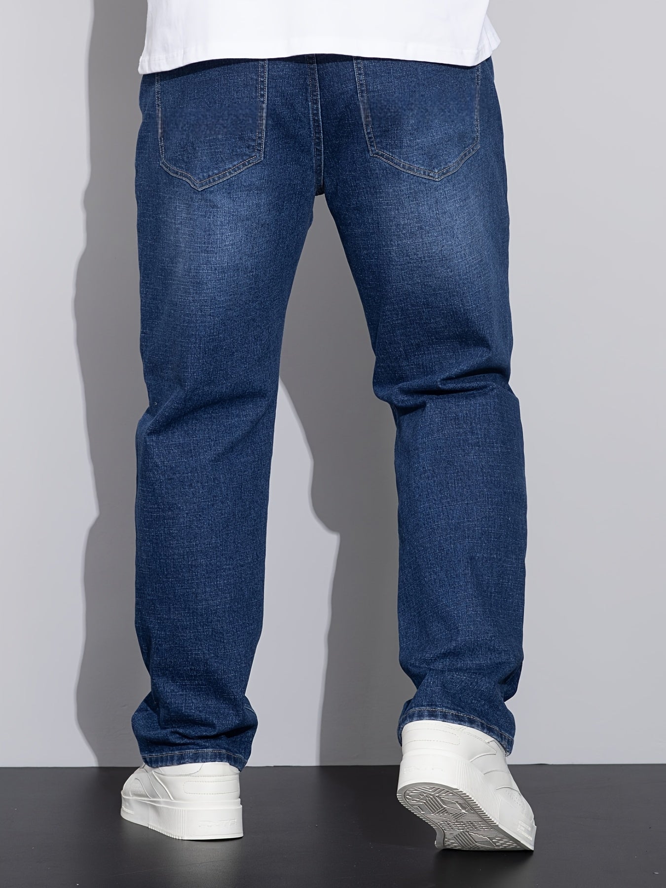 Men's straight-leg stretch denim jeans — detail view