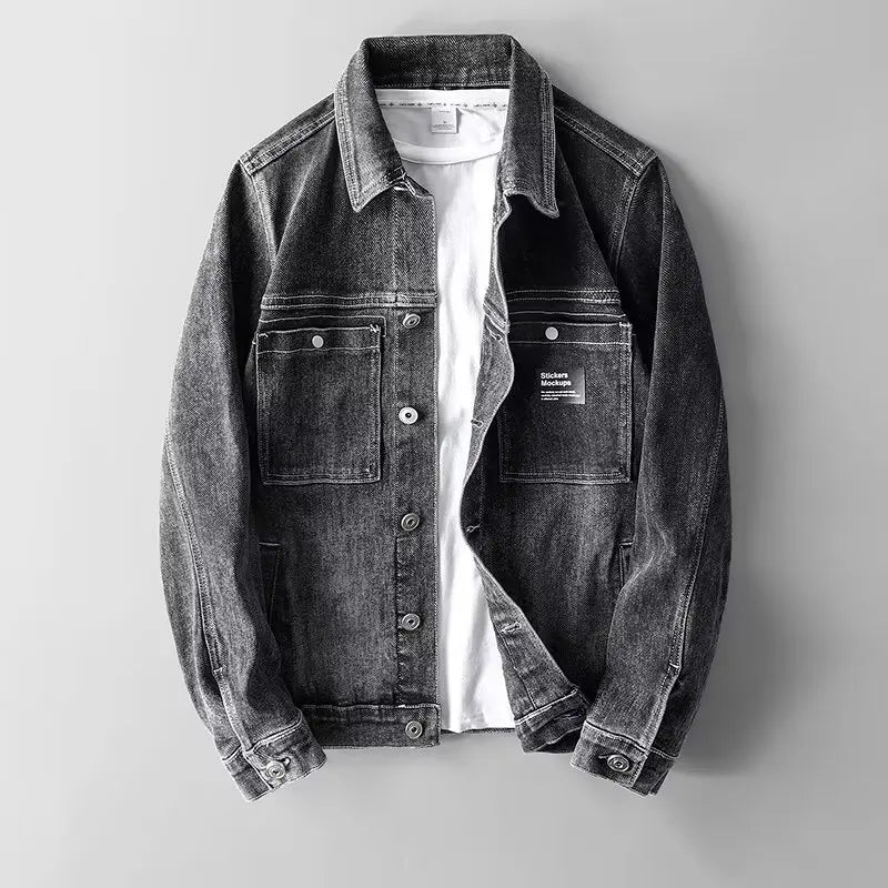 Men's cotton denim trucker jacket in black — detail view