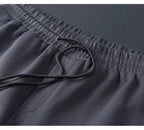 Men's two-piece zip tracksuit set — detail view