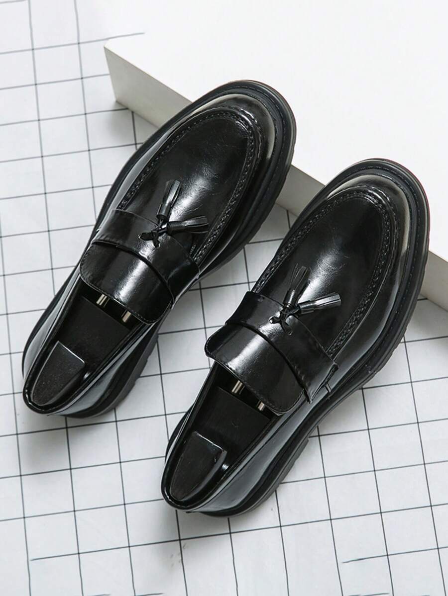Men's houndstooth tassel loafers in glossy black