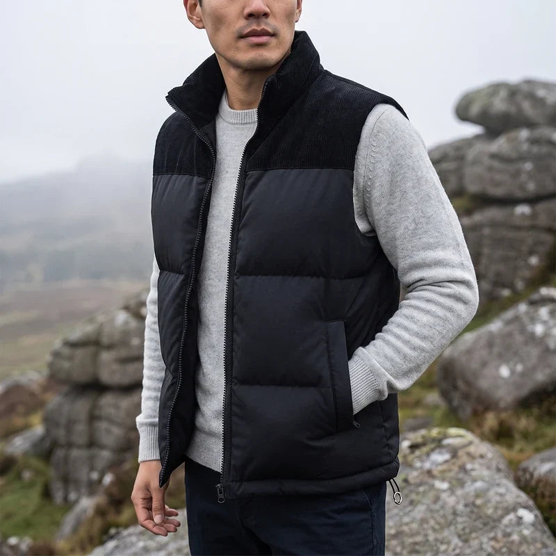 Men's corduroy yoke quilted puffer vest in black — detail view
