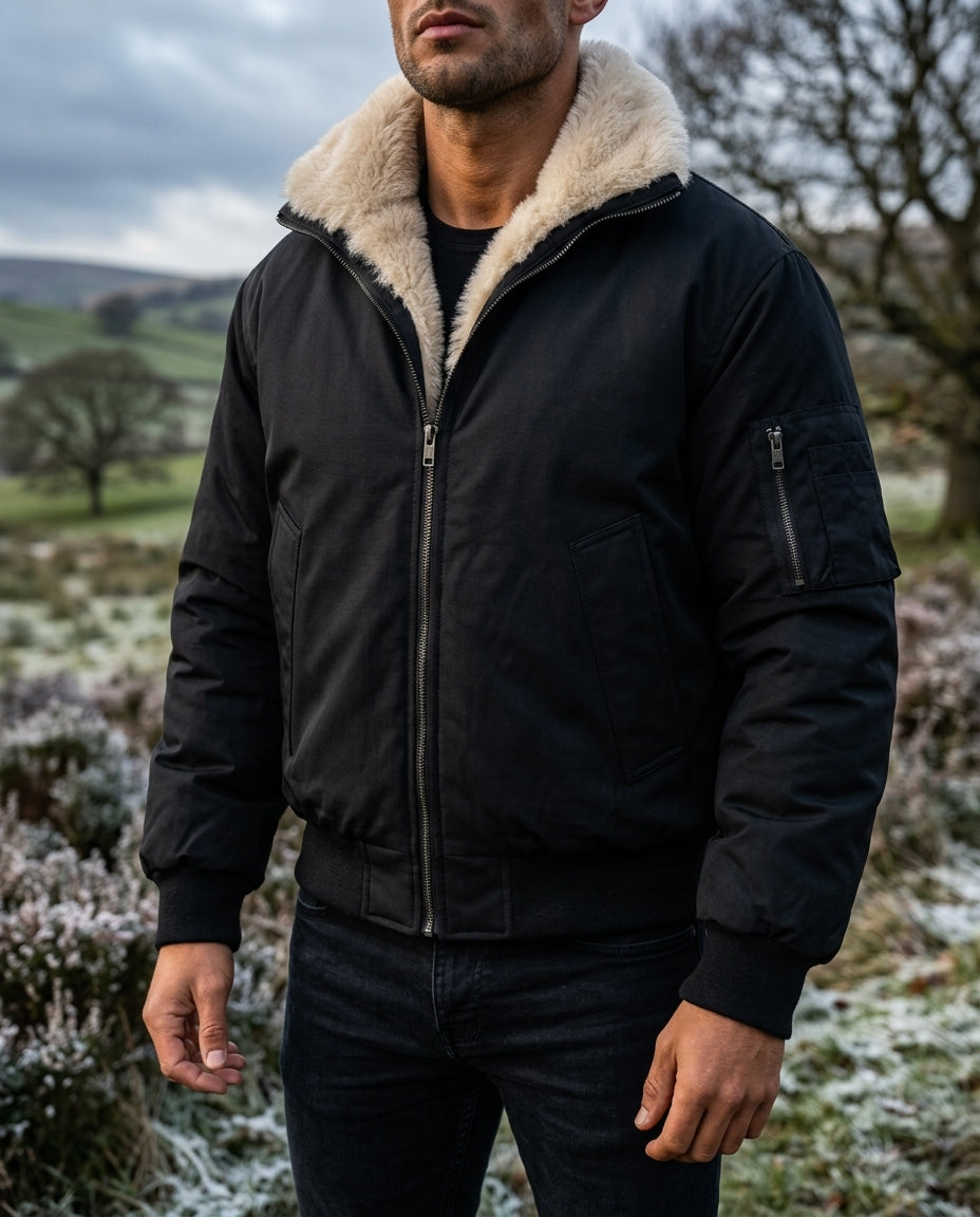 Men's faux fur lined bomber jacket in black — detail view